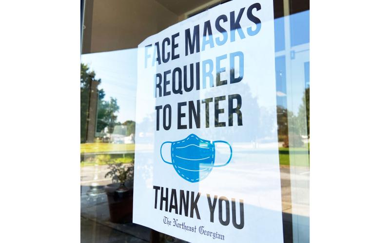 Some businesses are taking additional precautions in the wake of the latest surge.