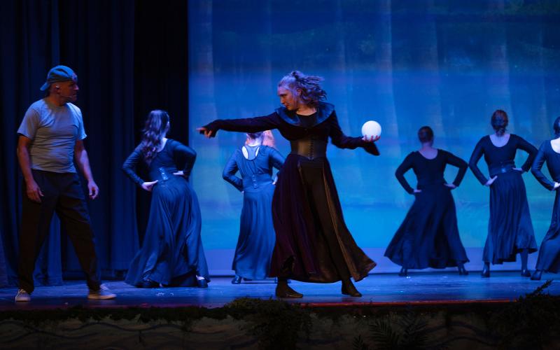 The Witch (Jubilee Chastain) pointing fiercely at Edward Bloom (Joel Morgan), with the Witch Ensemble in the background. ZACHARY TAYLOR/Submitted