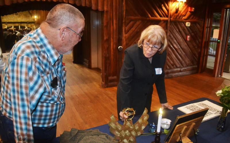 Ross Dover and Wanda Elrod Harding reminisce about their classmates who have passed on. MATTHEW OSBORNE/Staff