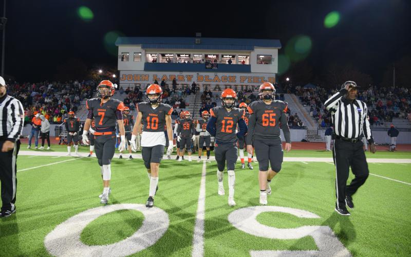 Seniors (from left) Caleb Wade, Noah Wilson, Gage Church and Ben Loudermilk went out for the coin toss. TOM ASKEW/Special