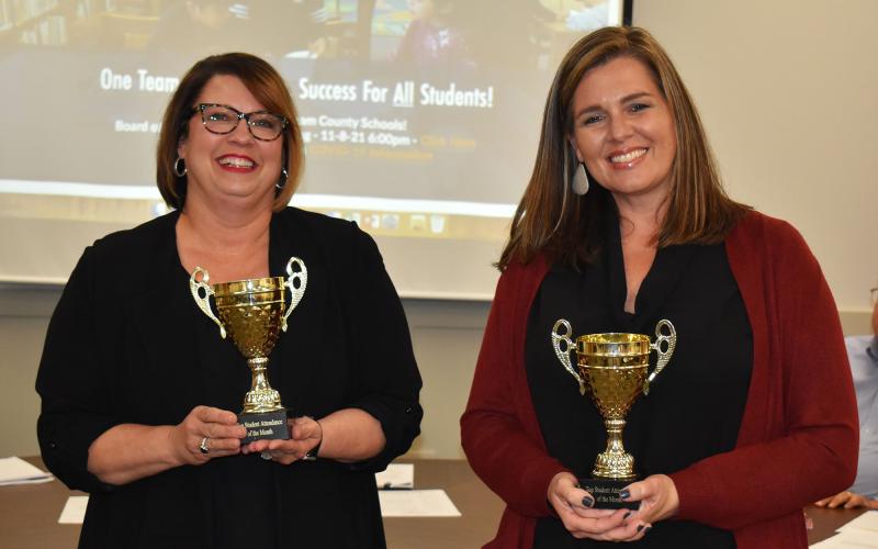 Accepting awards for Habersham County Schools’ student attendance leaders for October were (from left) Dr. Connie Franklin of the Ninth Grade Academy (top secondary) and Principal Aimee Shedd of Hazel Grove Elementary (top elementary for third straight month). MATTHEW OSBORNE/Staff
