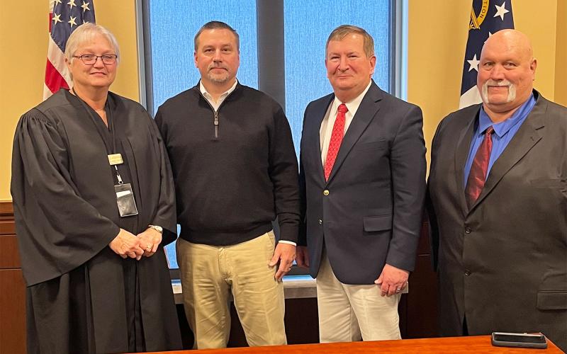 Judge Pam Wooley is shown with Habersham County Commissioners (from left) Ty Akins, Bruce Harkness and Bruce Palmer after Akins was sworn in Wednesday morning. MATTHEW OSBORNE/Staff