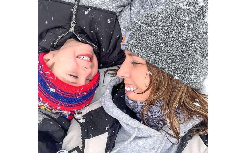 J.J. and his mom Ally Sosebee enjoy the snow in Mud Creek over the weekend. VICKI VINSON/Submitted