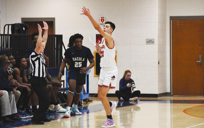 Mekhi Mawdesley celebrates a made 3-pointer during his 27-point performance. CODY ROGERS/Staff