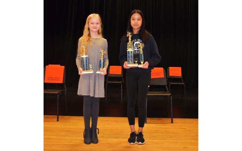 Kayla Nifong of South Habersham Middle School (right) won the Habersham County Spelling Bee, with Clarkesville Elementary’s Addisyn Hallford finishing as runner-up. AMARIS E. RODRIGUEZ/Staff