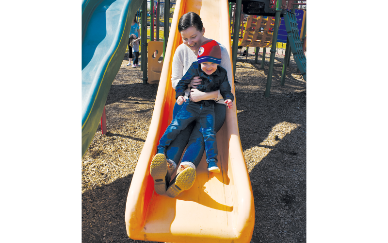 Christie Daniel and her son Brooks play at Demorest Springs Park. Daniel was able to find a daycare in the area for Brooks but said finding open spots is an issue for other parents. AMARIS E. RODRIGUEZ/Staff