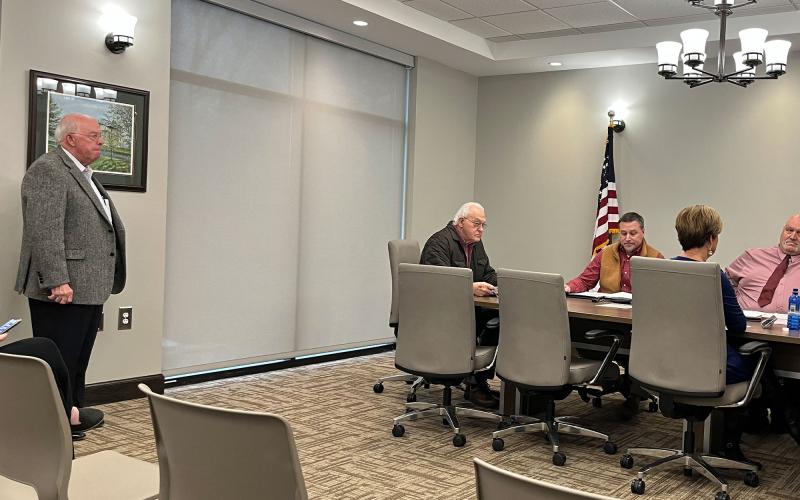 Doug McDonald (left) expressed his displeasure Monday with the county commissioners seeking a new airport manager. McDonald also attended the Airport Commission meeting earlier in the day. MATTHEW OSBORNE/Staff