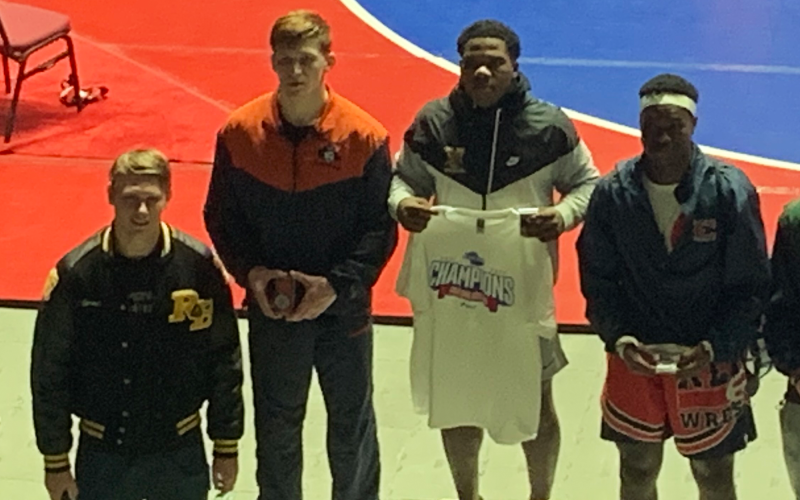 Habersham Central’s Colby Watson (second from left) takes the podium as the 6A state runner-up at 195 pounds in Macon on Friday night. BRADLEY JOHNSON/Submitted