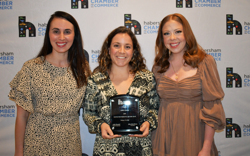 Young Professional of the Year Addie Aycock (middle) receives her award from Lindsey  Fitzgerald (left) and Haven Beavers. BRIAN WELLMEIER/Staff