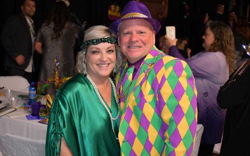 Someone has to be the best dressed, and that honor went to the epic suit of John Krippner, shown with his wife Kimberli. MATTHEW OSBORNE/Staff