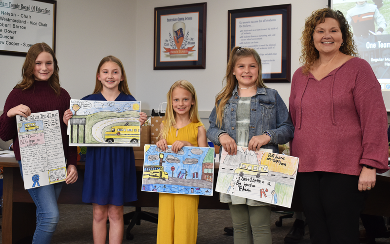 Shown from left are Blackburn, Glori Tyler of Clarkesville Elementary, Franklin, Caroline Sutton of Level Grove Elementary and Walker.AMARIS E. RODRIGUEZ/Staff