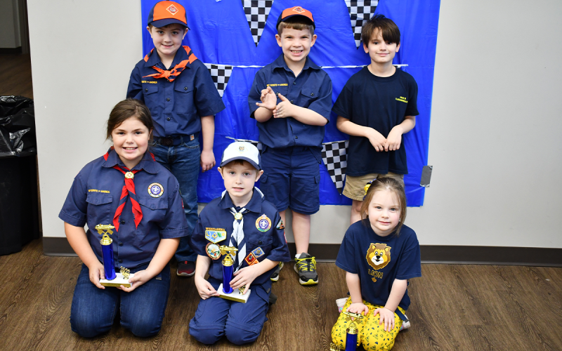 Winners of the Currahee District Pinewood Derby held Saturday in Clarkesville are (front row, from left) Elle Redman (Cub Scout Pack 106, Banks County), Chase Andrews (Pack 68, Toccoa) and Callie Mayes (Pack 68). Additional qualifiers for the Northeast Georgia Council Pinewood Derby in Gwinnett County on April 23 are (back row, from left) Spencer Etheridge, Ethan Nail and Oliver Osborne of Pack 5 in Clarkesville.