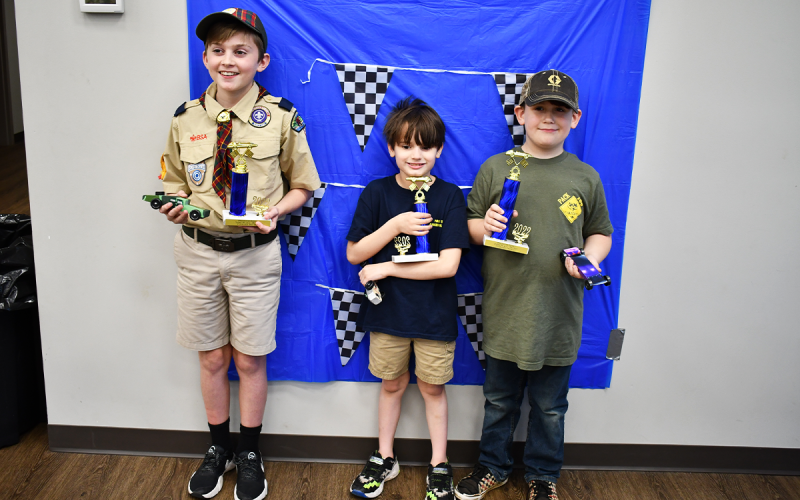 Design winners at the Currahee District Pinewood Derby were (from left) Dylan Johnson (Pack 5, Clarkesville, third place), Oliver Osborne (Pack 5, second place) and Noah Spulock (Pack 106, Banks County, first place).