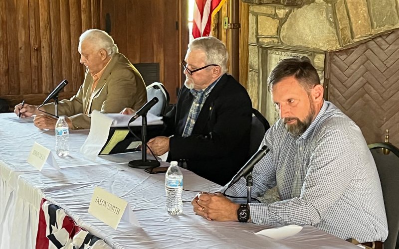 District 3 County Commission candidates (from left) Jimmy Tench, Jimmy Dean and Jason M. Smith answer questions for the public on Tuesday night at the Community House in Cornelia. MATTHEW OSBORNE/Staff