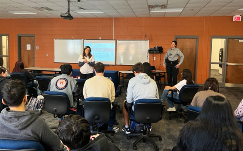 Students listen to a presentation about law enforcement. ALICE BREWER/Submitted