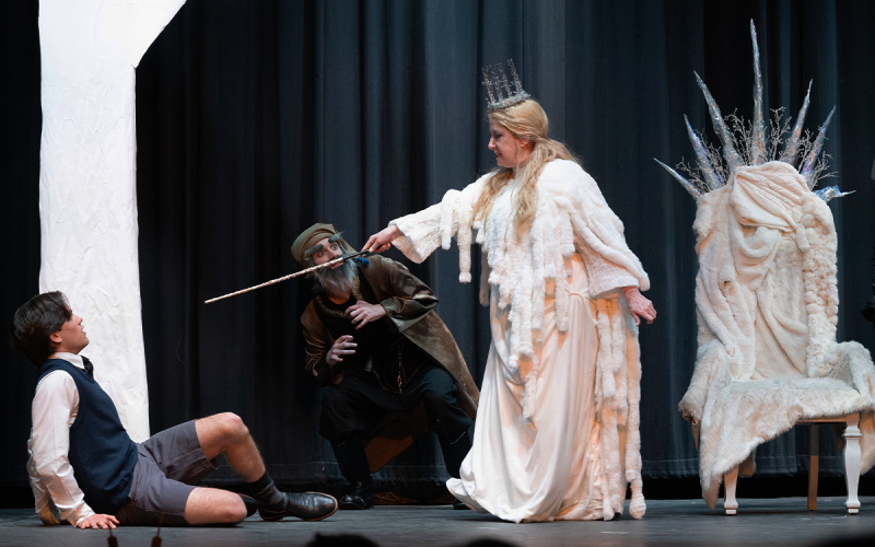 Jadis, played by Melodee M. Spevack, daringly points her sword at Edmund, played by Joseph Sosebee, who is easily fooled by her tasty treats of Turkish Delight in Habersham Commuity Theater’s production of “The Lion, the Witch and the Wardrobe.” ZACHARY TAYLOR/Special