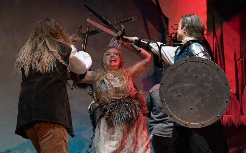 Peter and Aslan in a battle against the White Witch who appears to be a formidable opponent as she defends against two incoming swords. ZACHARY TAYLOR/Special