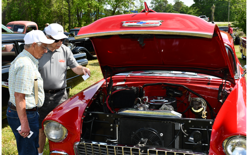Doug Nicholson of Clarkesville and Pete Raper of Cornelia check out Nicholson’s 1955 Chevy. MATTHEW OSBORNE/Staff