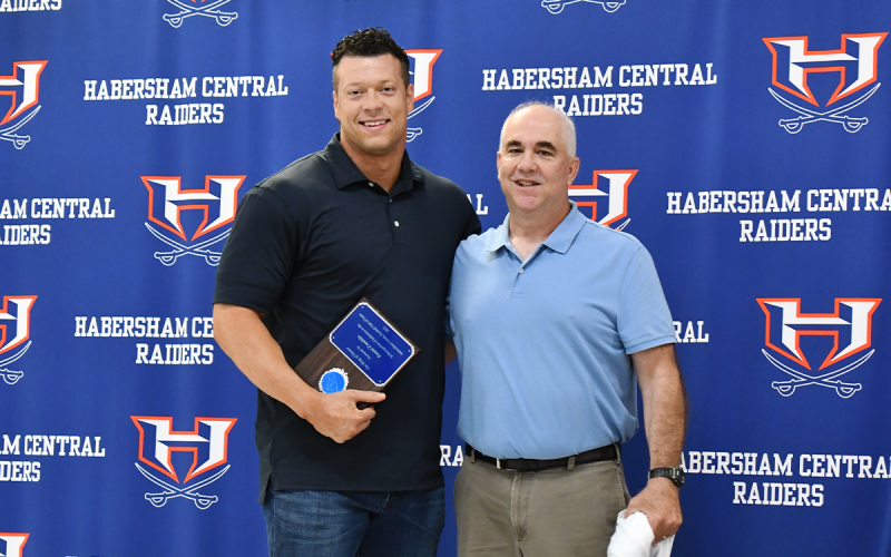 Daniel Franklin accepts his award from Greg Moore. Franklin went on to play linebacker at Oklahoma. MATTHEW OSBORNE/Staff