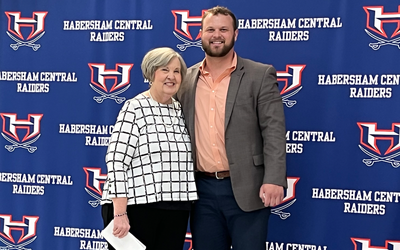 Judy Forbes presented Bo Hatchett for the Ring of Honor. Hatchett said Coach Gene Cathcart told him he would be harder on him than anyone because he knew he could do great things. MATTHEW OSBORNE/Staff