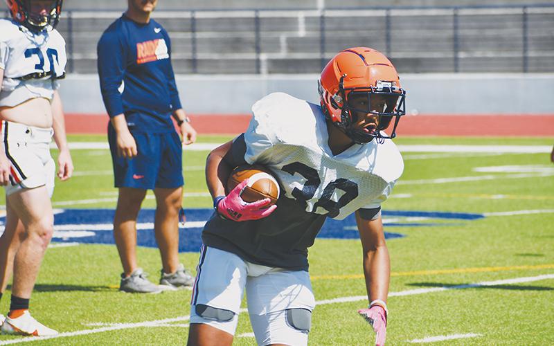 Habersham Central’s Anthony Thomas catches a swing pass in practice earlier this spring.