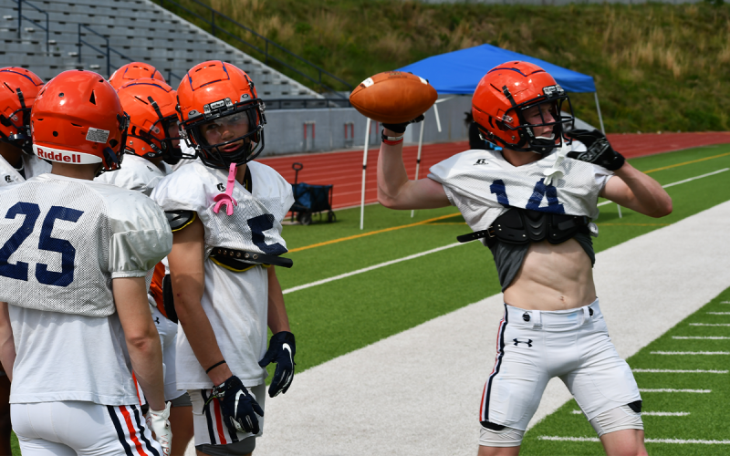 Habersham Central’s Zeke Whittington (5) confers with a teammate during practice. MATTHEW OSBORNE/Staff