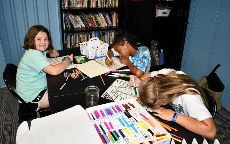 Students draw baskets of fruit during their art class at the Tim Lee Boys &amp; Girls Club on Tuesday. ROWAN EDMONDS/Staff