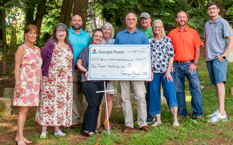 Shown, from left, are Historic Clarkesville Cemetery Preservation, Inc. board members and Georgia Power representatives Diane Brown, Cindy Grace, Jeremy Spradlin, E. Lane Gresham, Kathy Walker, Brent Edwards, Brooks Garcia, Polly Earle, Josh Likins and Carson Sprinkle. CARSON SPRINKLE/Submitted