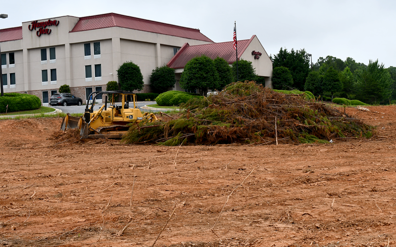 Land has been cleared for the future Marriott hotel near the current Hampton Inn in Cornelia. ROWAN EDMONDS/Staff
