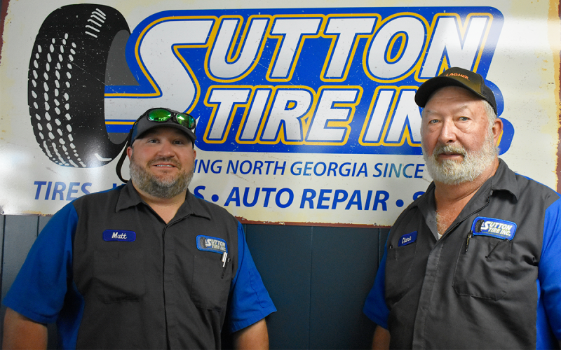 Matt Farmer (left) and Clark Sutton are confident Sutton Tire will see its 100th anniversary by continuing to build relationships. JENNIFER RAMSAY/Staff