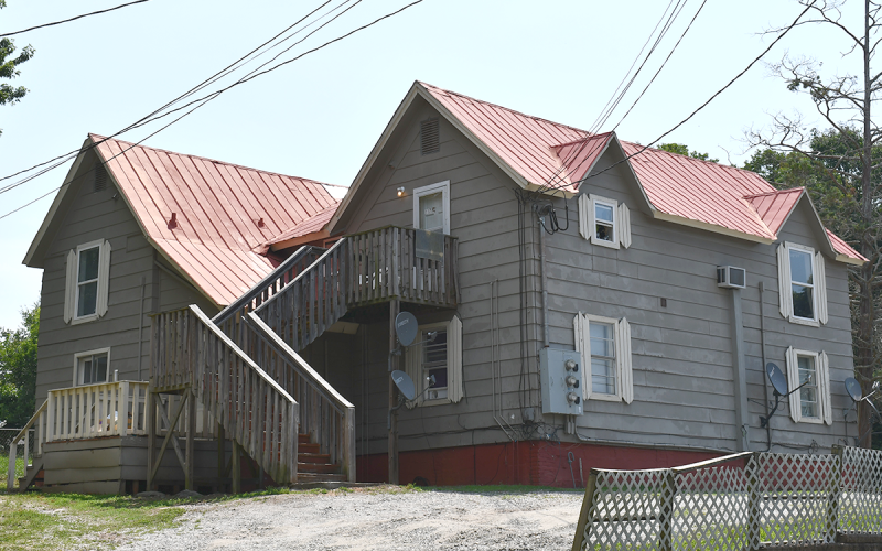 A wheelchair-bound woman and her autistic son were forced to vacate this home on King Street in Baldwin. BRIAN WELLMEIER/Staff