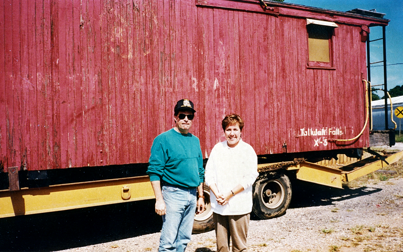 In this 1993 photo, Buck Snyder stands with Annette Nash in front of the wooden X5 caboose Snyder brought to Cornelia. At the time, the caboose needed a lot of work, and that refurbishment and restoration has been done, thanks to Snyder and the Cornelia Depot Association. SUBMITTED