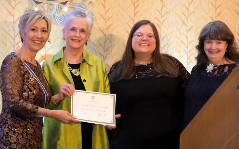 Cindy Grace presents historic preservation grant to Amy Wright. DWIGHT DOVER/Submitted