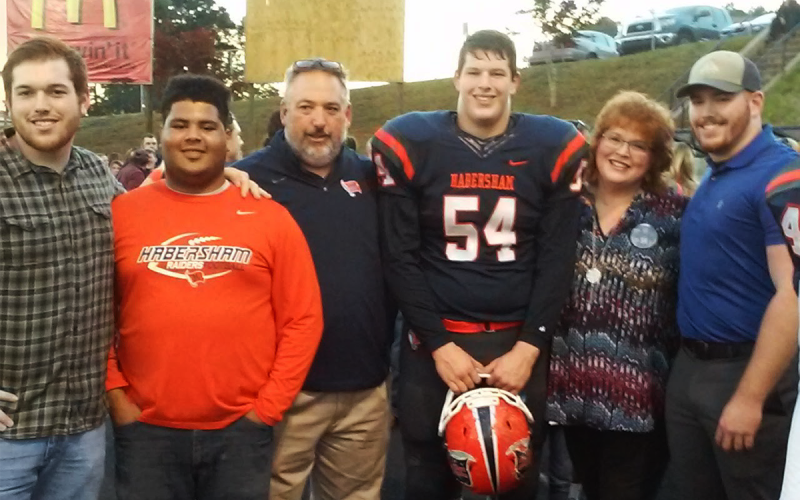 Krista Ivester is shown in 2015 at a Raider football game with her family. At the time of her retirement, she was Department Science Head and a Science ambassador for the state. SUBMITTED