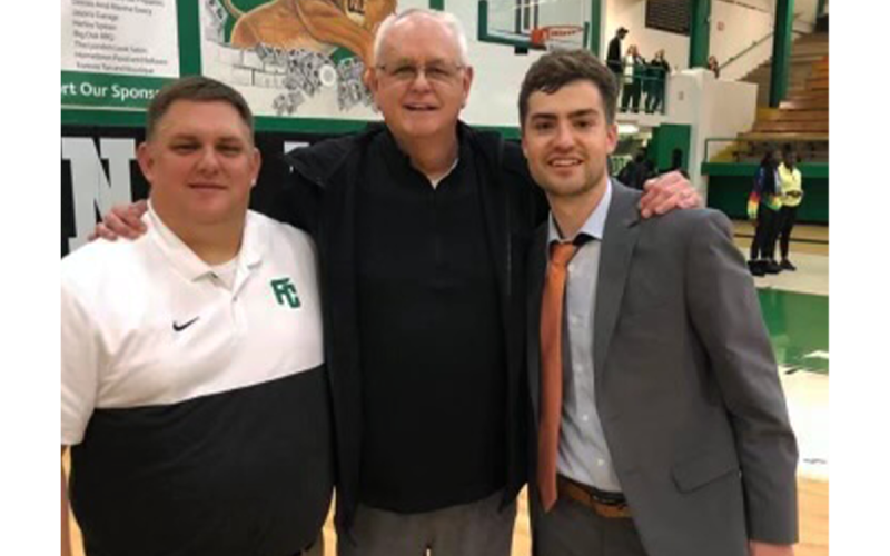 Coach Don Ledbetter (middle) is shown with former players Jason Shaver (left) and Cody Anderson, both of whom went on to be varsity head coaches.