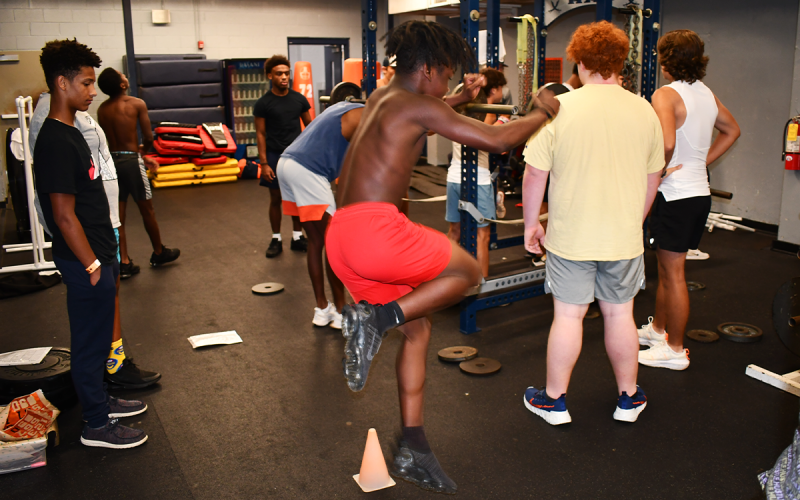 Tylon Davis takes a break from pumping iron to work on agility drills. MATTHEW OSBORNE/Staff