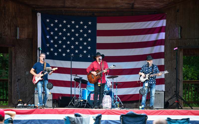 In what served as an encore to the Fourth of July, the Steve Bryson Band returned to play for the assembled guests at Red, White and Tunes. Playing lead guitar is Shayne Pruitt, and on bass is Gene Norman. ZACH TAYLOR/Special