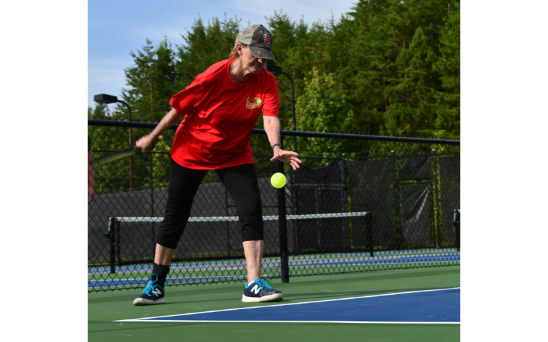 Beth Russell takes her turn at serving. MATTHEW OSBORNE/Staff