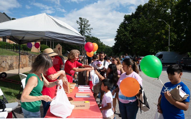 Cornelia United Methodist Church volunteers hand out school supplies including spiral notebooks, backpacks, and colored pencils. ZACH TAYLOR/Special