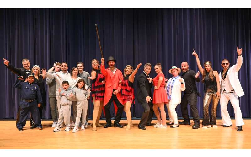 Dancing with the Stars for Hope brings together folks from all walks of the community. Here, the whole group takes a minute to strike a pose in between numbers.