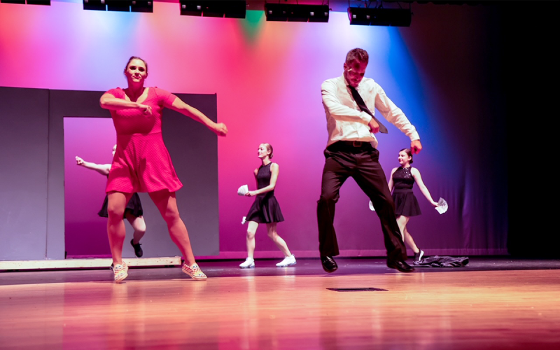 “Sweet Disaster” team members Jessie Owensby and Heath Barrett get into their routine Saturday night.
