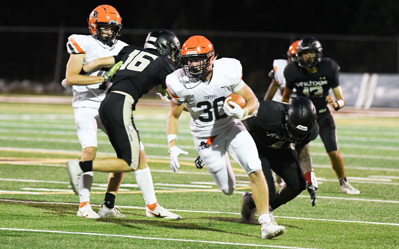 Blandon Grizzle was too much for the East Hall Vikings on Friday night, scoring twice and pounding out 153 yards. TOM ASKEW/Special