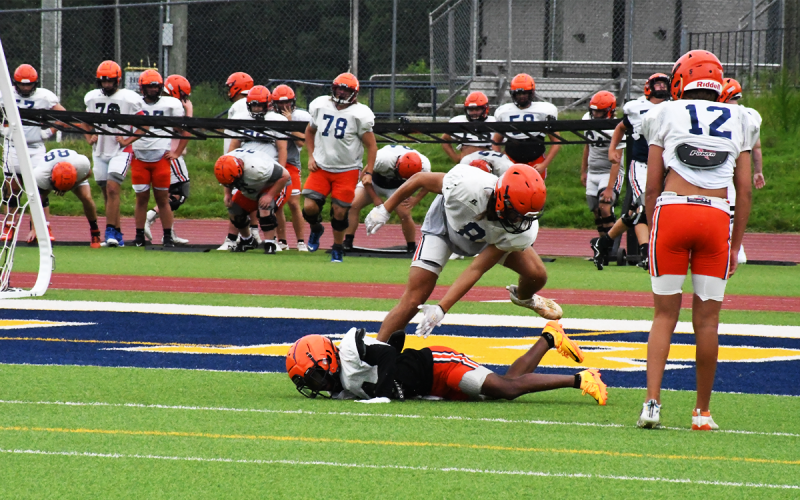Some guys were so eager to hit, they ran right over their own teammates. MATTHEW OSBORNE/Staff