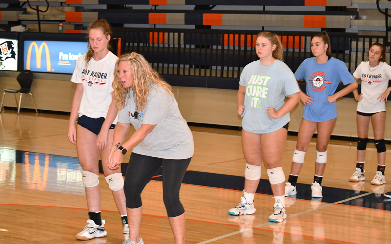 Habersham Central volleyball coach Lindsay Herrin gives instructions at Monday’s practice. Herrin is starting her 11th year as varsity head coach. Shown are Allie Church, Abbey Donaldson, MaryKate Bush and Maci Williams. MATTHEW OSBORNE/Staff