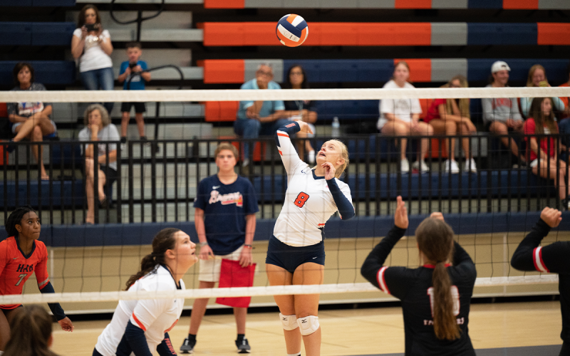 Lady Raiders senior Landrey Pike goes for a spike after a set by teammate Kenzie Chitwood. ZACH TAYLOR/Special