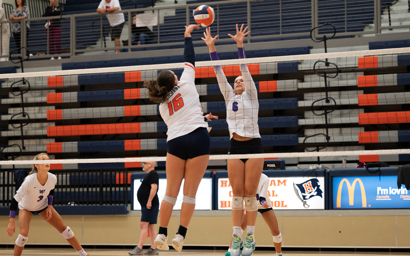 Callyn Chosewood (16) lands a spike through a West Forsyth defender to tie up the set. ZACH TAYLOR/Special