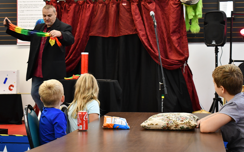 Jamie Roberts of the Roberts Family Illusions performed a magic show for the children at Saturday’s Veterans Jamboree in Cornelia. MATTHEW OSBORNE/Staff