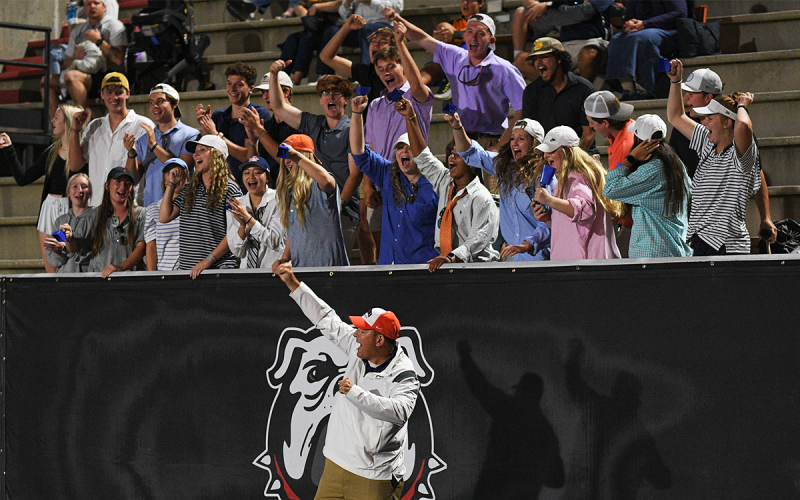 Habersham Central Principal Dr. Jonathan Stribling leads students in a cheer near the conclusion of Friday’s win over Forsyth Central. TOM ASKEW/Special
