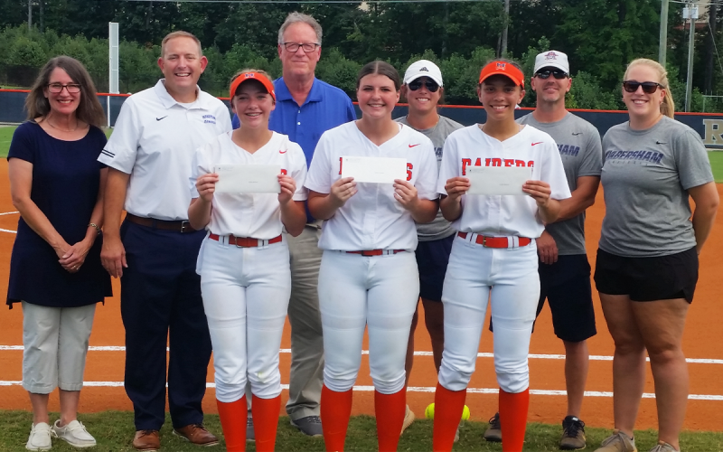 Raider varsity softball players who have earned an Academic Letter were presented academic helmet decals by the Academic Booster Club during a pre-game ceremony to recognize their outstanding performance in the classroom. Pictured from left are Academic Booster Club President Sylvia Hotard, Habersham Central Principal Jonathan Stribling, senior Bailey Barfield, Athletic Director Geep Cunningham, senior Emma Forester, Head Coach Karly Thompson, junior Charli Barbour, Assistant Coach Ansley Patrum.