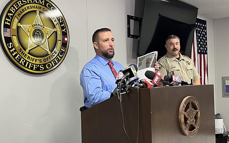 Habersham County Sheriff's Investigator George Cason shows reporters a picture from the Tallulah Falls school zone camera of Deb Collier's van traveling toward Clayton on Sept. 10.